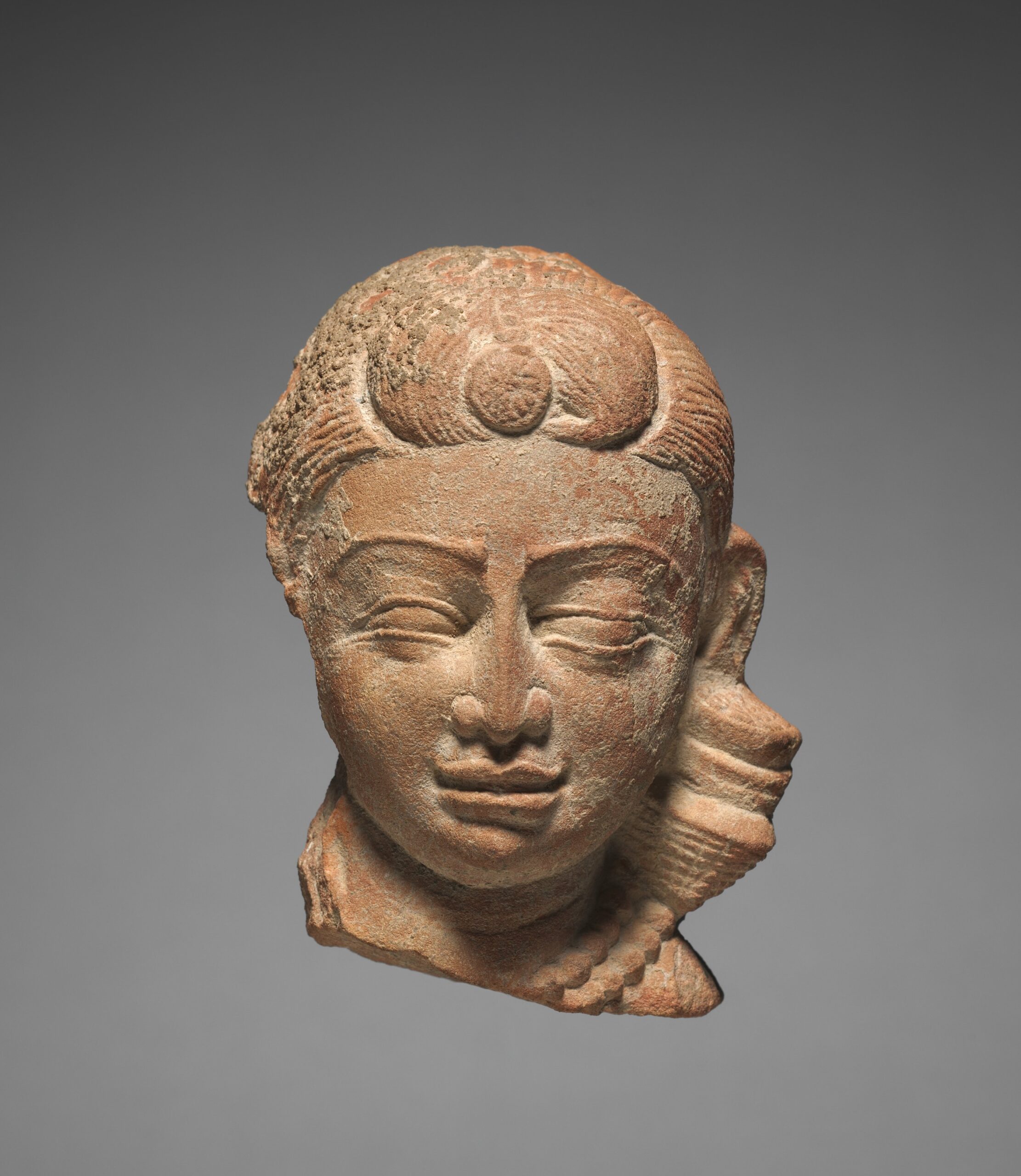 Miniature Female Head, mathura, 100s CE