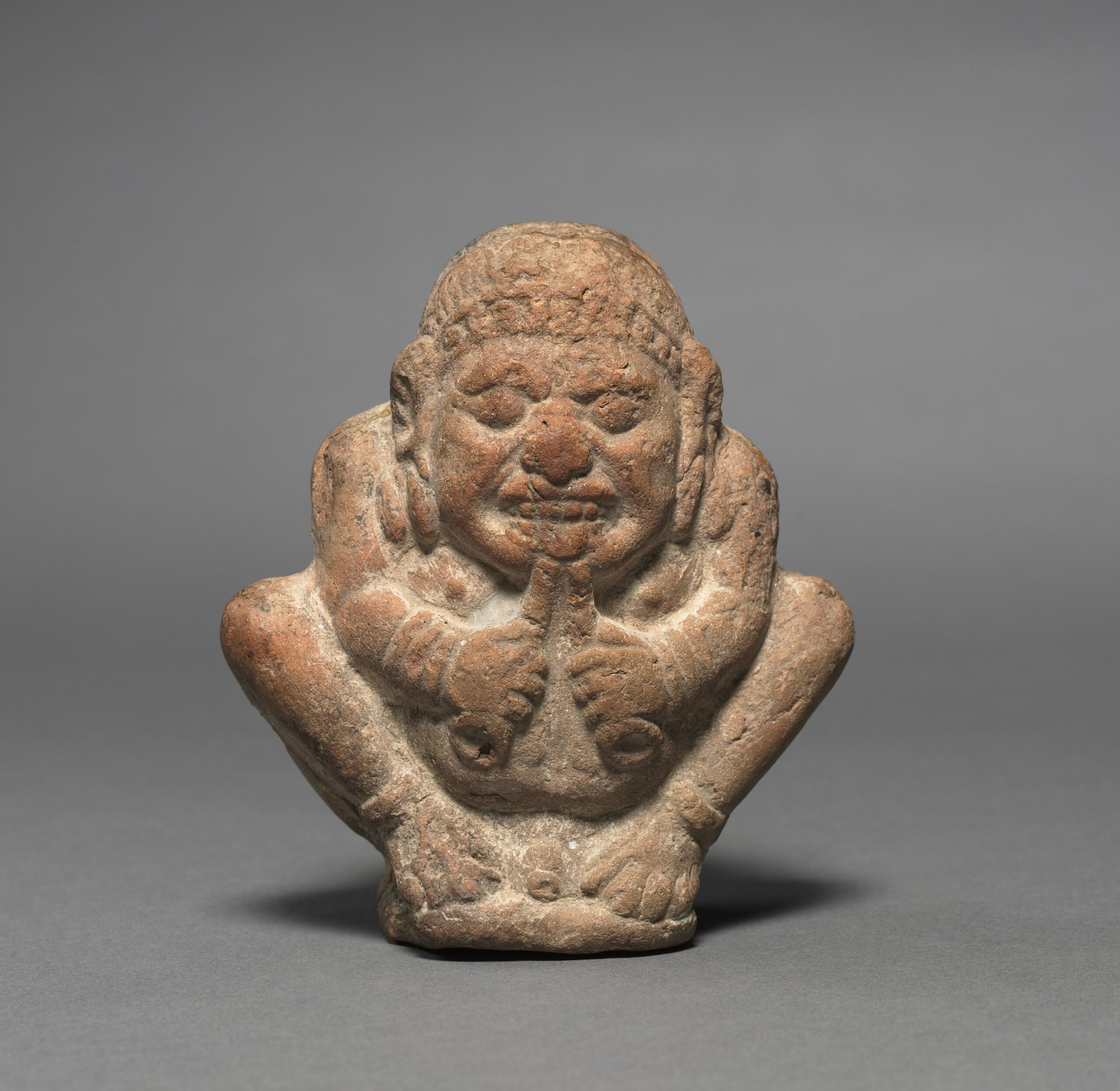 Crouching Dwarf Musician, terracotta, 200–100 BCE