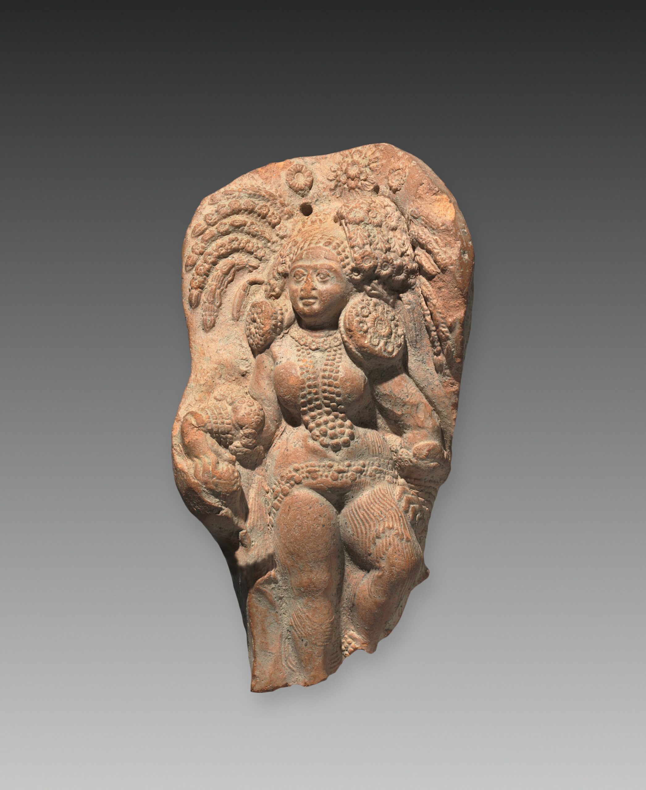 Female Figure, Probably a Nature Divinity (Yakshi), terracotta, c. 75 BCE