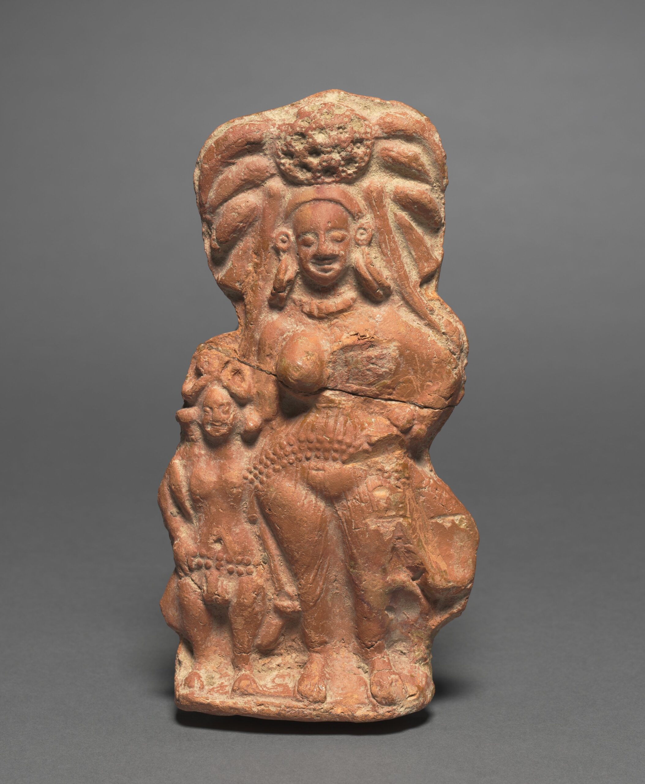 Nature Divinity (Yakshi) with Dwarf Hermaphrodite, terracotta, c. 100 BCE