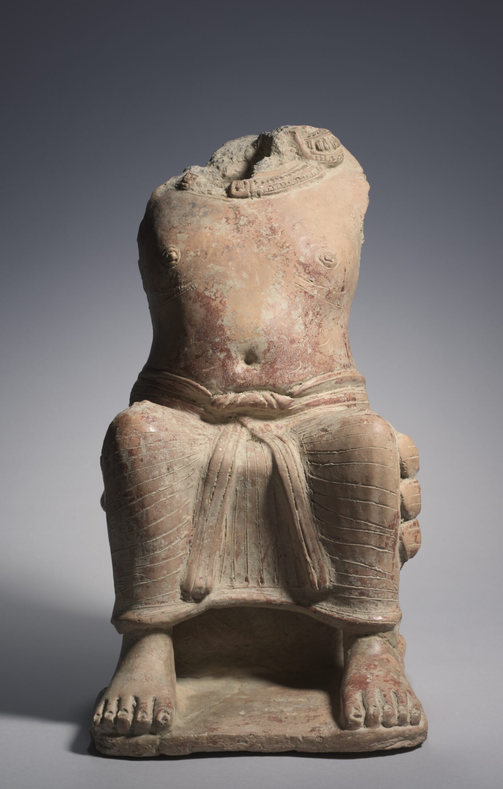 Seated Yaksha, terracotta, 300s CE